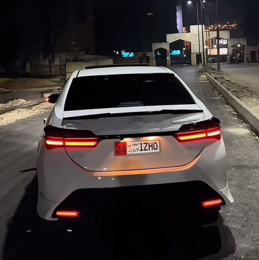 CORROLLA GRANDE ALTIS - RS SPOILER - ABS PLASTIC PREMIUM QUALITY - GLOSSY Black PaintedRaja Autos.pk