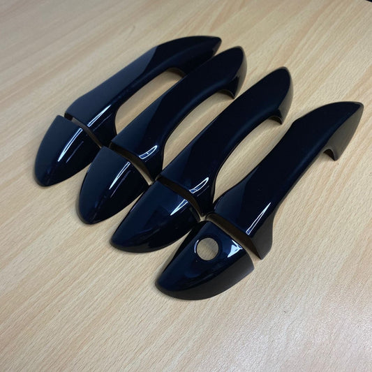 GLOSSY BLACK DOOR HANDLES COVER FOR TOYOTA CORROLLA 2014 - 23Raja Autos.pk
